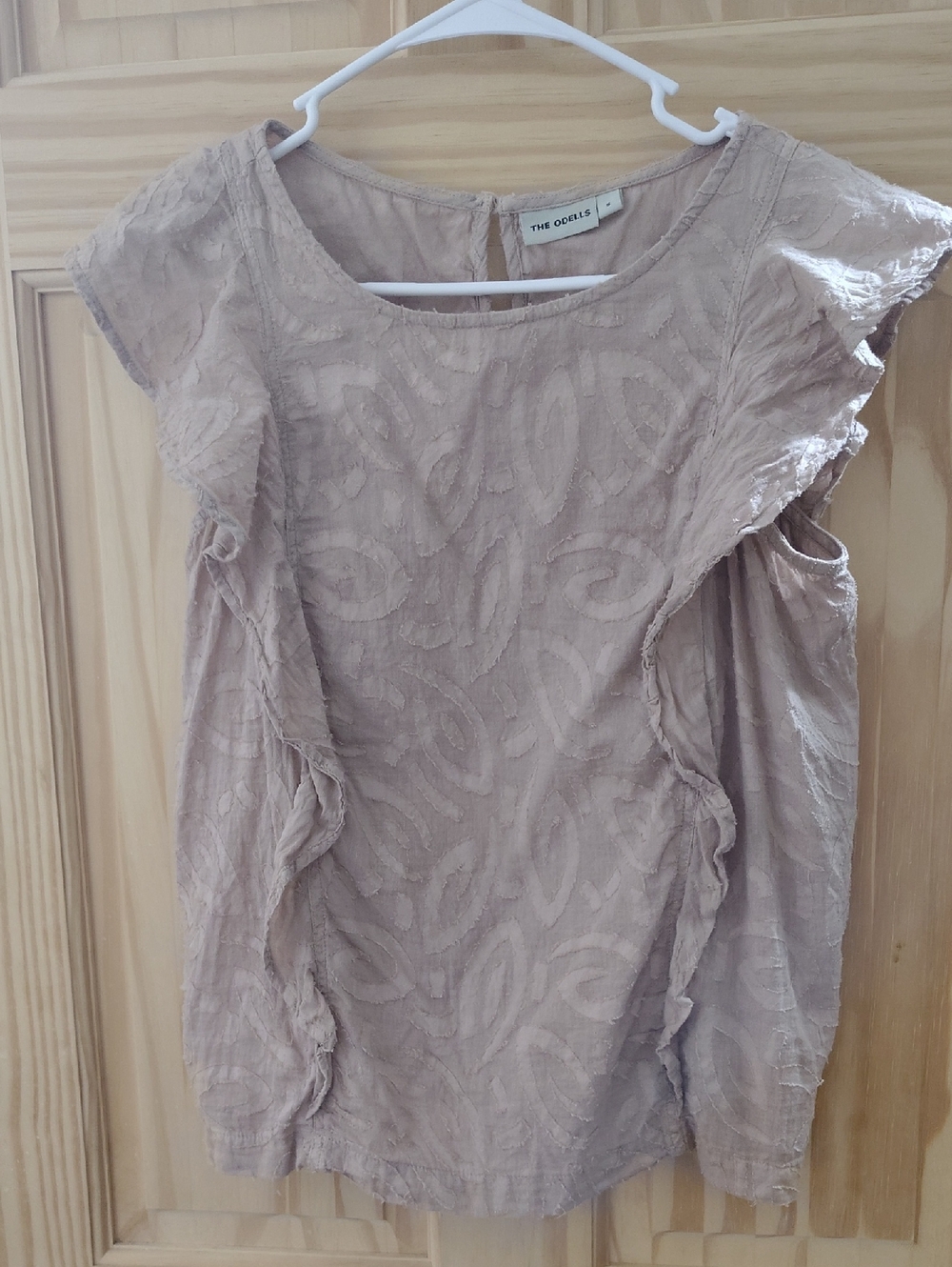 The Odells Sleeveless Ruffle Blouse — Taupe, 100% Cotton